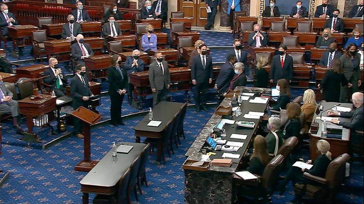 House impeachment managers arrive Jan. 25 in the U.S. Senate chamber with the article of impeachment alleging incitement of insurrection against former President Donald Trump.