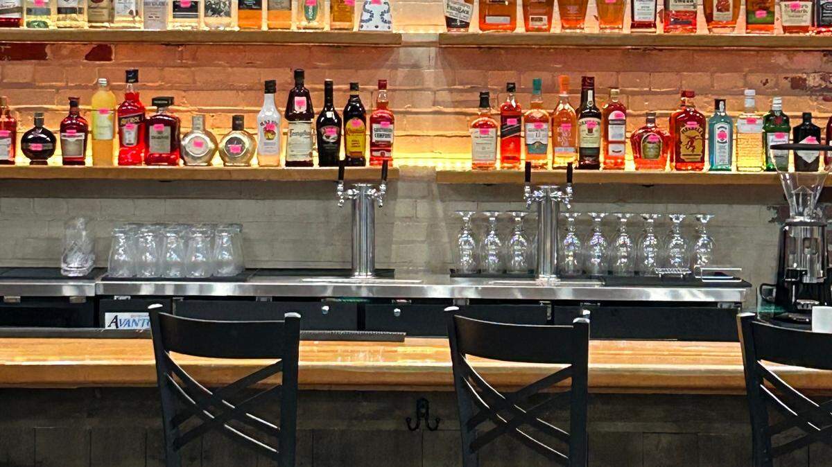 Tim Lezette, a Mint Hill woodworker, created the cherry wood bar for Hayne Street Gastrolounge.