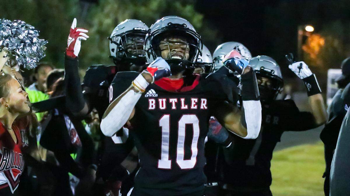 Eli Sylvester celebrates as Butler wins in a last quarter upset