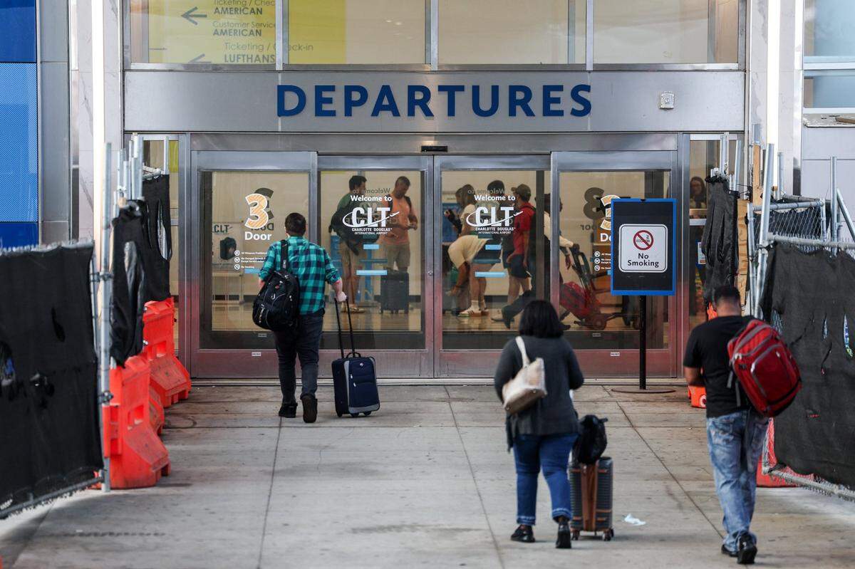 Flights depart and arrive as usual after delays and cancellations due to sustained inclement weather from Hurricane Debby in Charlotte on Friday, Aug. 9, 2024.