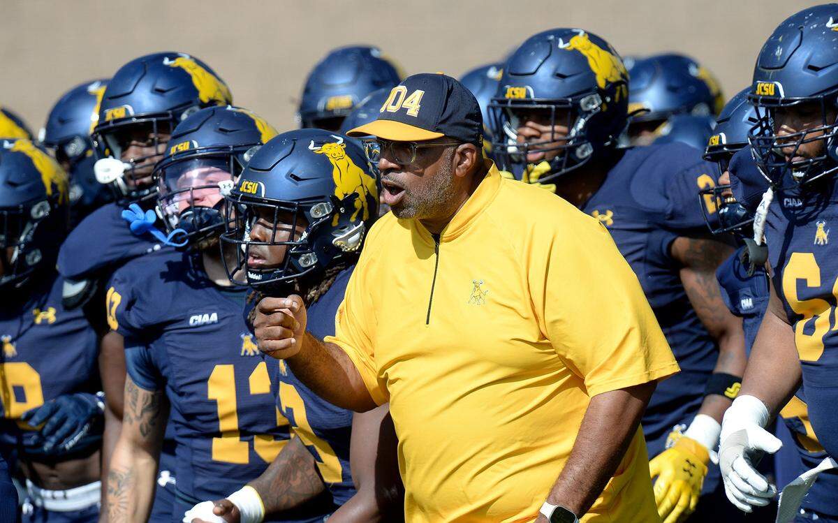 Johnson C. Smith football coach Maurice Flowers fires up his team before a game against Fayetteville State on Nov. 2, 2024.