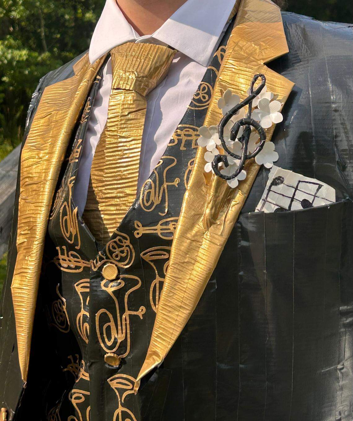 Nicholas Moore, a rising senior at South Iredell High School in Troutman NC, is a finalist in a national competition for his marching band-inspired prom tuxedo made of Duck Brand duct tape.