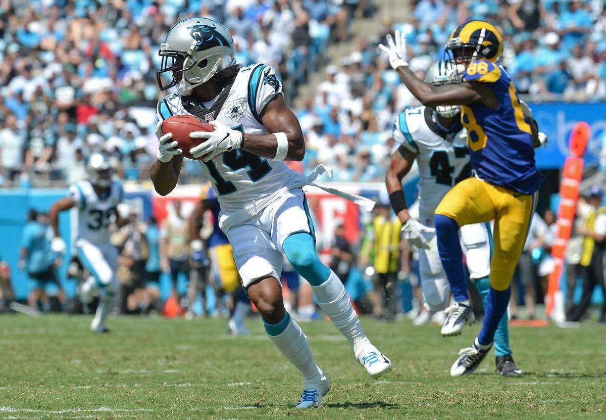 Carolina Panthers wide receiver and punt returner Ray-Ray McCloud, left, turns to break upfield after catching a Los Angeles Rams punt during action on Sunday, September 8, 2019 at Bank of America Stadium. The Los Angeles Rams defeated the Panthers 30-27.