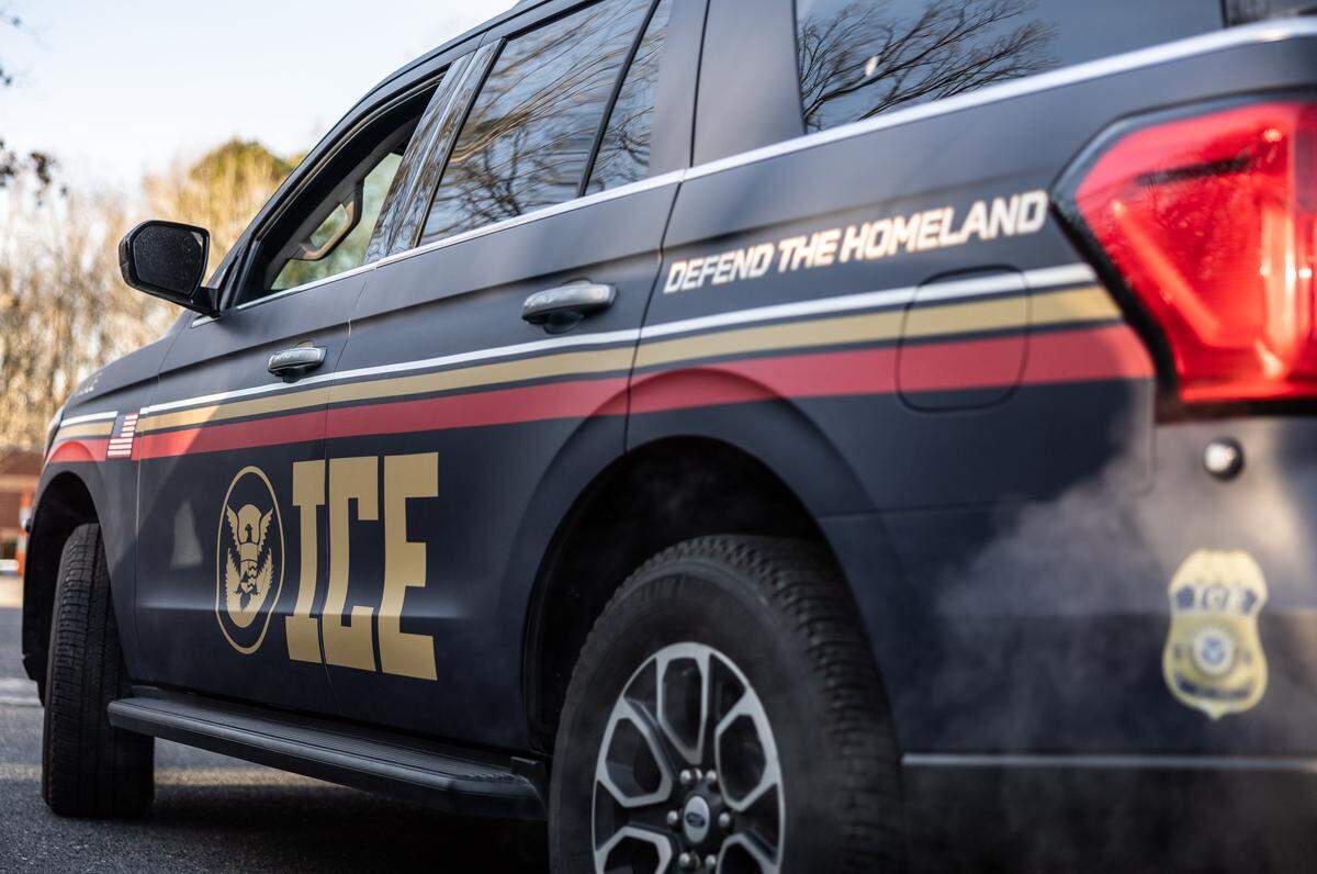 I.C.E branded office vehicles at the entrance of the Department Homeland Security office in Charlotte, N.C., on Wednesday, January 21, 2026.