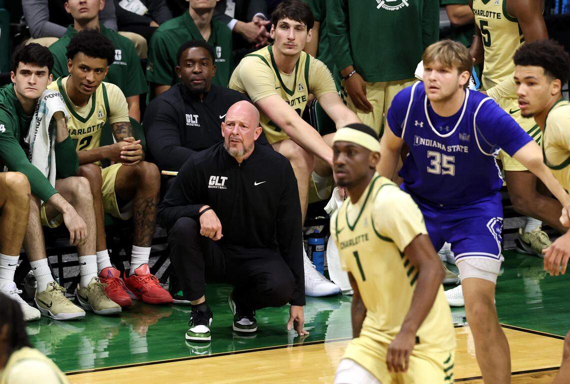 Charlotte 49ers head coach Aaron Fearne, center, watches his team battle Indiana State on Monday at Halton Arena.