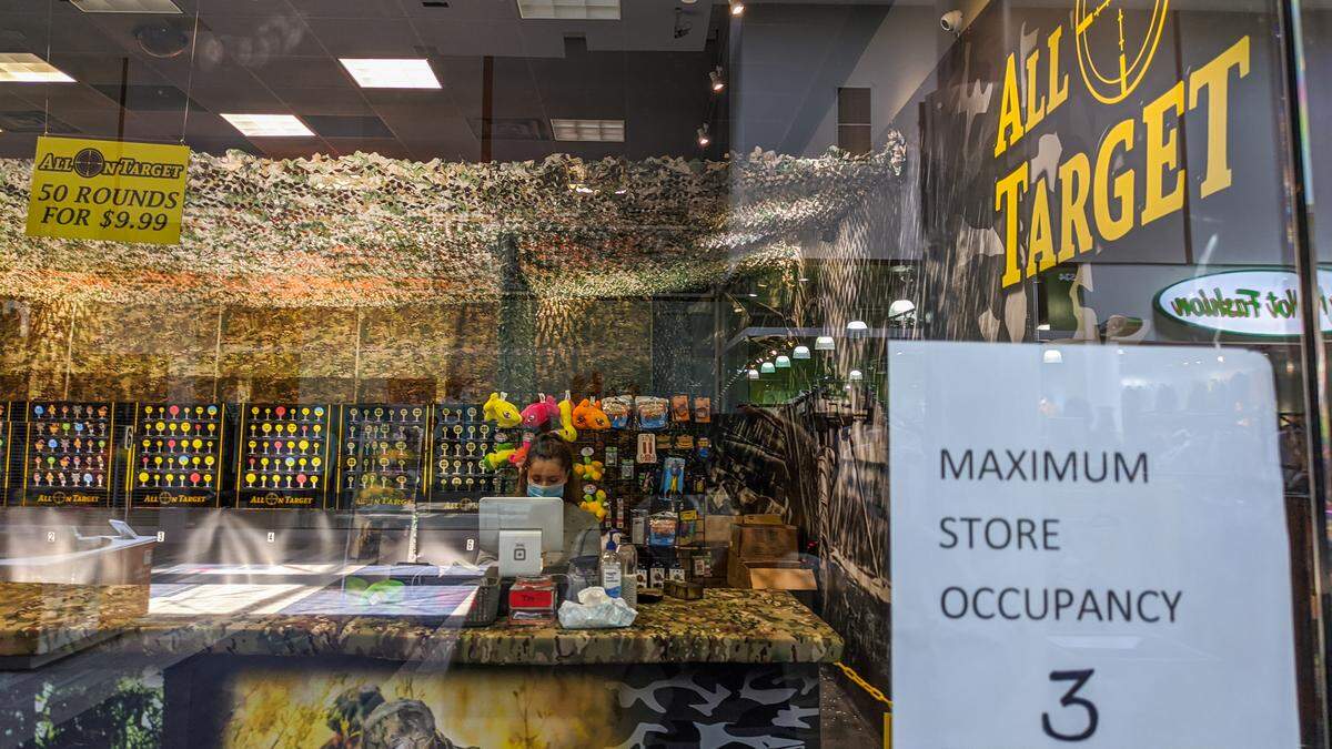All On Target displays a maximum occupancy sign in their store front May 12, 2020. 