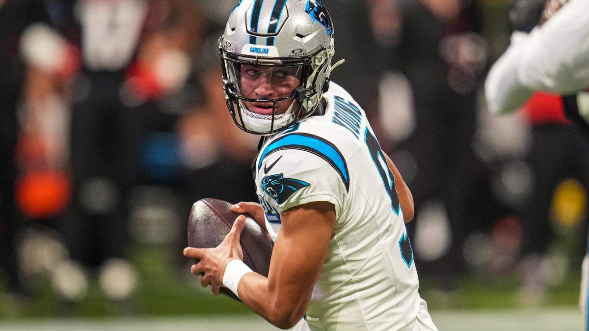 Carolina Panthers quarterback Bryce Young (9) rolls out to pass against the Atlanta Falcons Sunday. Young had a career-high five total touchdowns in Carolina’s 44-38 overtime win.