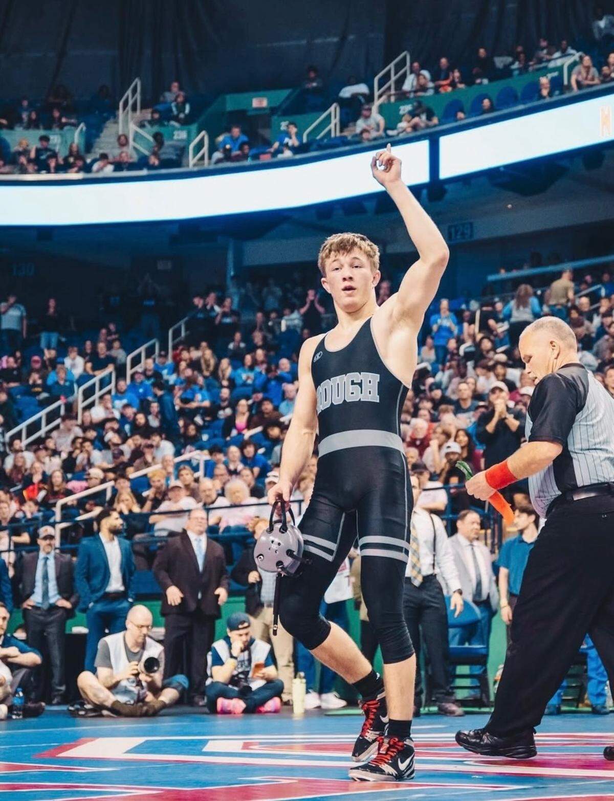 Hough wrestler Tyton Kostoff is The Observer’s high school wrestler of the year.