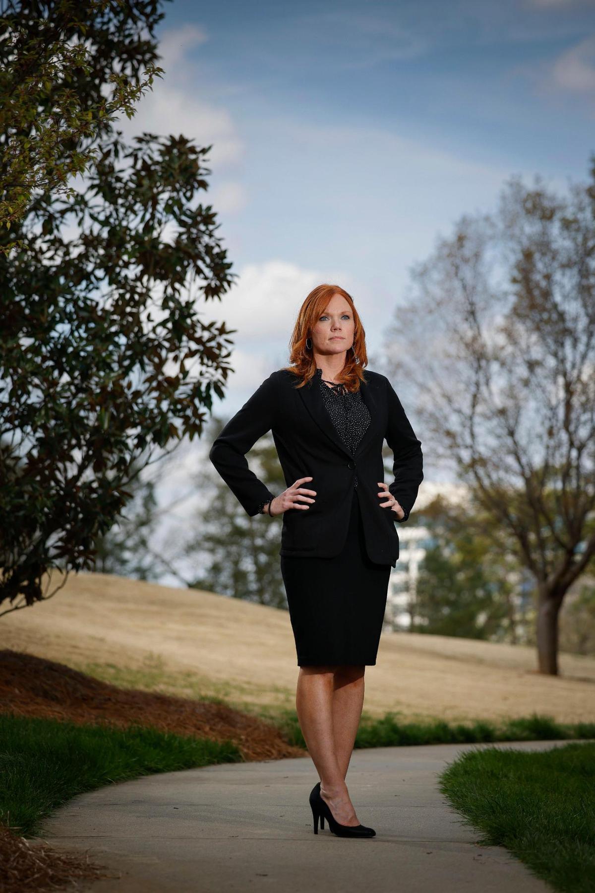 Jennifer Zelluridge, seen here near her Ballantyne office building, formerly worked in retail and now works in a customer service role for the HVAC company Service Logic.