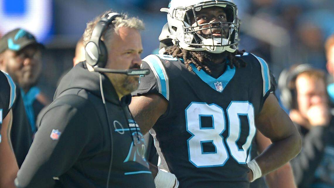 Carolina Panthers tight end Ian Thomas, right, stands on the sideline after being called for a penalty during second quarter action against the New England Patriots at Bank of America Stadium in Charlotte, NC on Sunday, November 7, 2021.