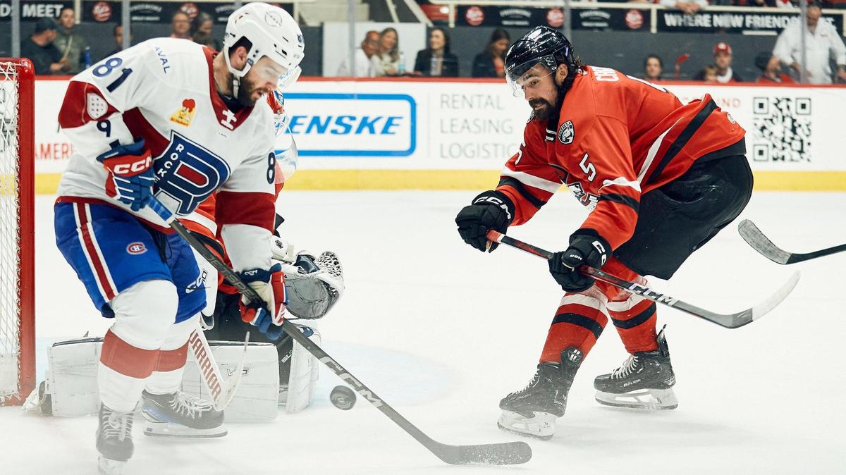 Defenseman Trevor Carrick, right, during the Charlotte Checkers’ conference final series against the Laval Rocket at Bojangles Coliseum.