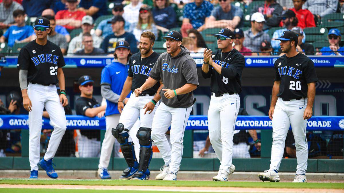 Duke players cheer on the field during the ACC championship game vs. N.C. State on Sunday at Truist Field in Charlotte.