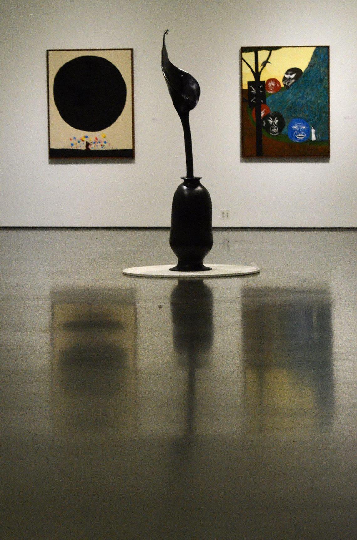 Some of the nearly 100 works of art by Clare Rojas are exhibited on the fourth floor of the Bechtler Museum of Modern Art.