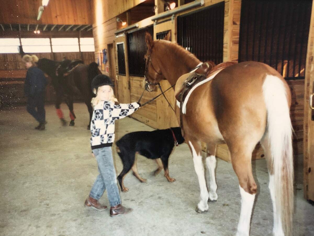 Morgan Fogarty at age 7 with a pony named Spice at the horse facility her parents ended up buying.