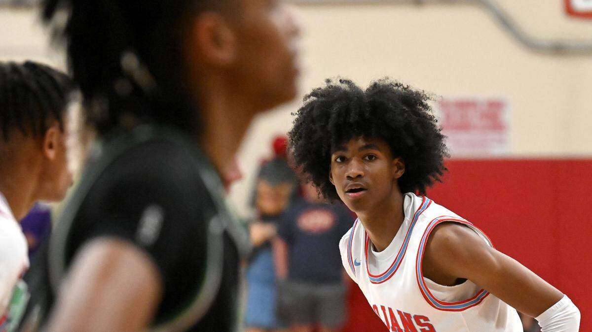 Olympic’s Kameron Taylor, right, watches for the ball to be inbounded during first half action against Myers Park on Friday, February 10, 2023 at Olympic High School.