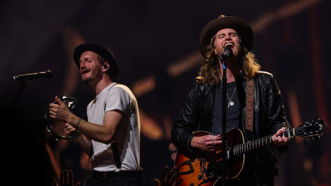 Wesley Schultz, right, performs alongside fellow founding member Jeremiah Fraites as The Lumineers headline a concert at Spectrum Center on Saturday, August 27, 2022 in Charlotte, NC.