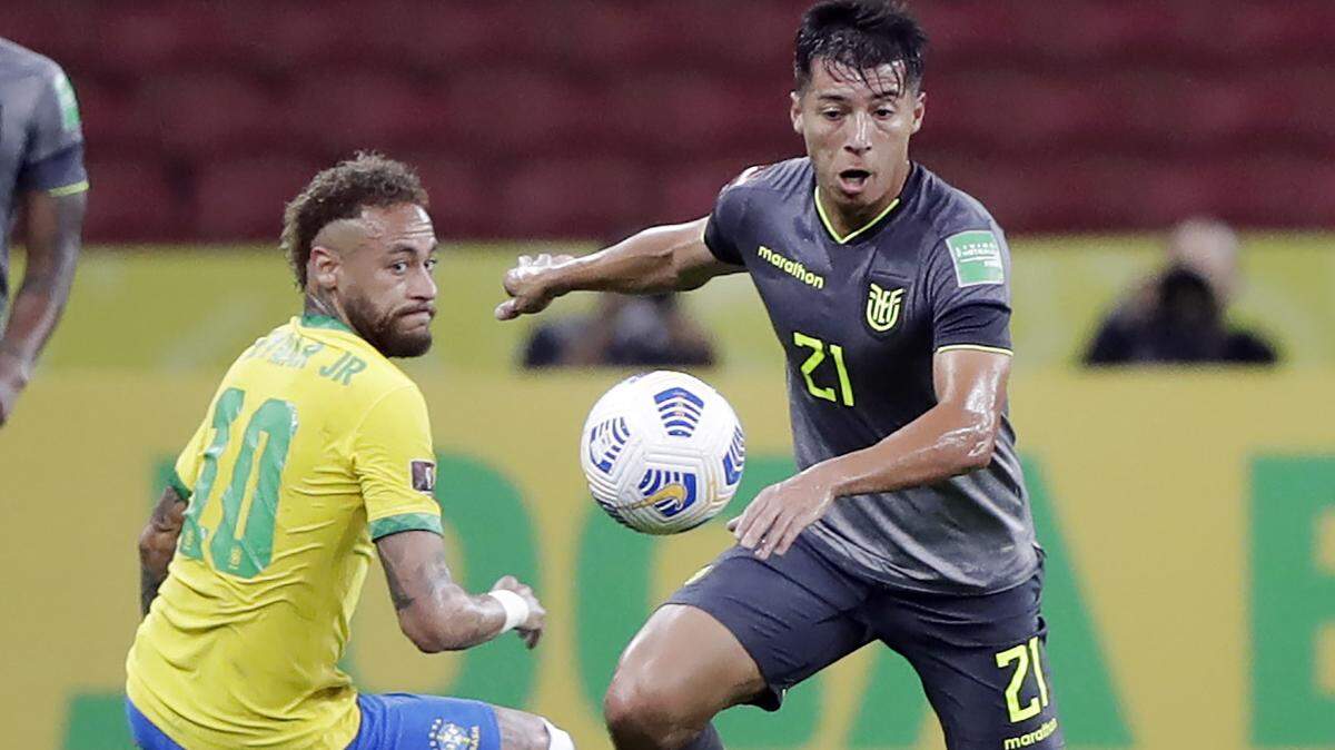 Ecuador’s Alan Franco, right, during a qualifying soccer match for the FIFA World Cup Qatar 2022 at Beira-Rio stadium in Porto Alegre, Brazil on June 4, 2021.