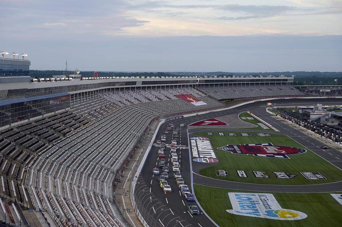 CONCORD, NORTH CAROLINA - MAY 26: Ben Rhodes, driver of the #99 Tenda Heal Ford, leads the field to starts the NASCAR Gander Outdoors Trucks Series North Carolina Education Lottery 200 at Charlotte Motor Speedway on May 26, 2020 in Concord, North Carolina. (Photo by Jared C. Tilton/Getty Images)