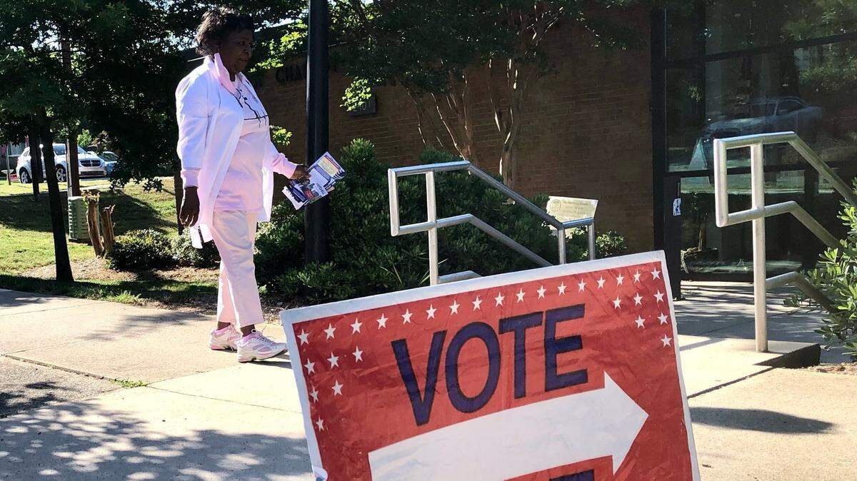 A North Carolina voter arrives at the West Charlotte Community Center, the polling place for Precinct 25, on May 17, 2022.