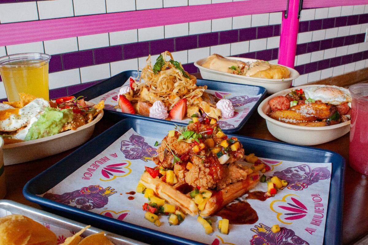 Que Fresa’s weekend brunch options include Chicken & Waffles, which comes with Chipotle maple syrup and mango salsa.
