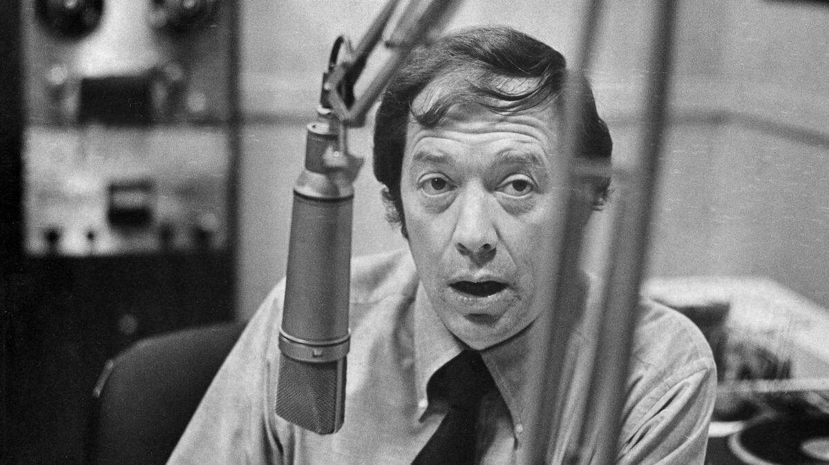 Ty Boyd, longtime Charlotte media personality, at the microphone at WBT-AM in 1973.