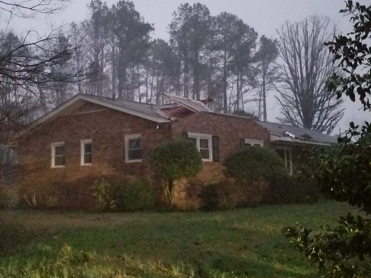 Andy Bagwell of Abbeville, S.C., took this photo of a damaged home just minutes after a tornado cut a nearly 1.7 -mile path through the city on Friday night.
