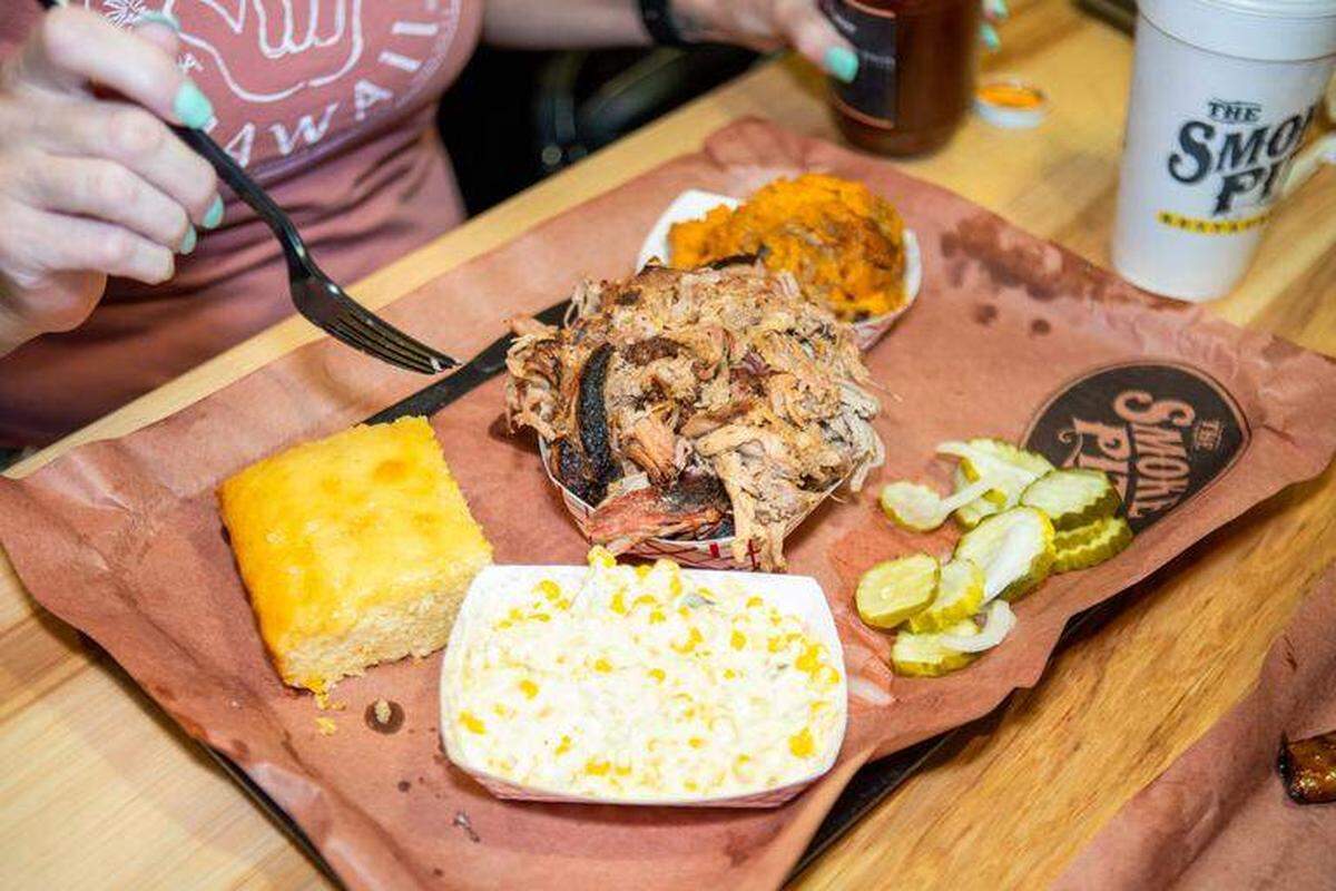The Smoke Pit features North Carolina-style pulled pork, Texas-style chopped brisket, chicken and other proteins cooked in smokers.