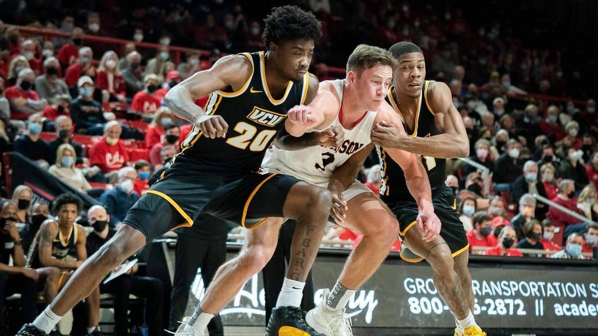 Davidson’s Sam Mennenga (3) tries to box out for a rebound against VCU on Jan. 26. The Wildcats host Saint Louis on Saturday.
