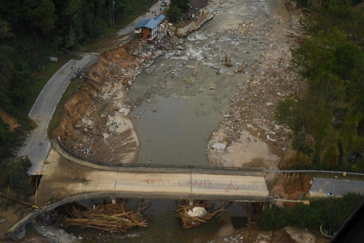 A view over flood-damaged western North Carolina on Monday, Sept. 30, 2024, as Andy Petree flies a helicopter through Operation Airdrop to deliver supplies.