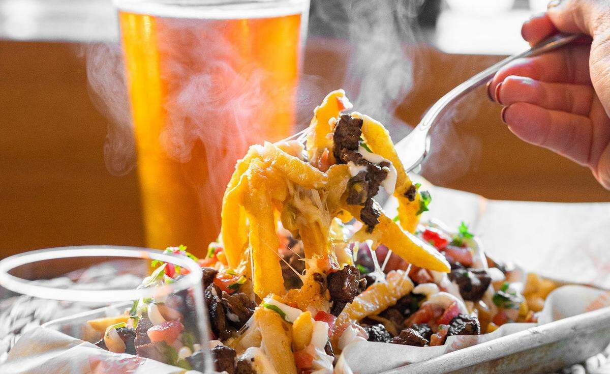 Mother’s Comfort Food & Cocktails’ Carne Asada Fries.