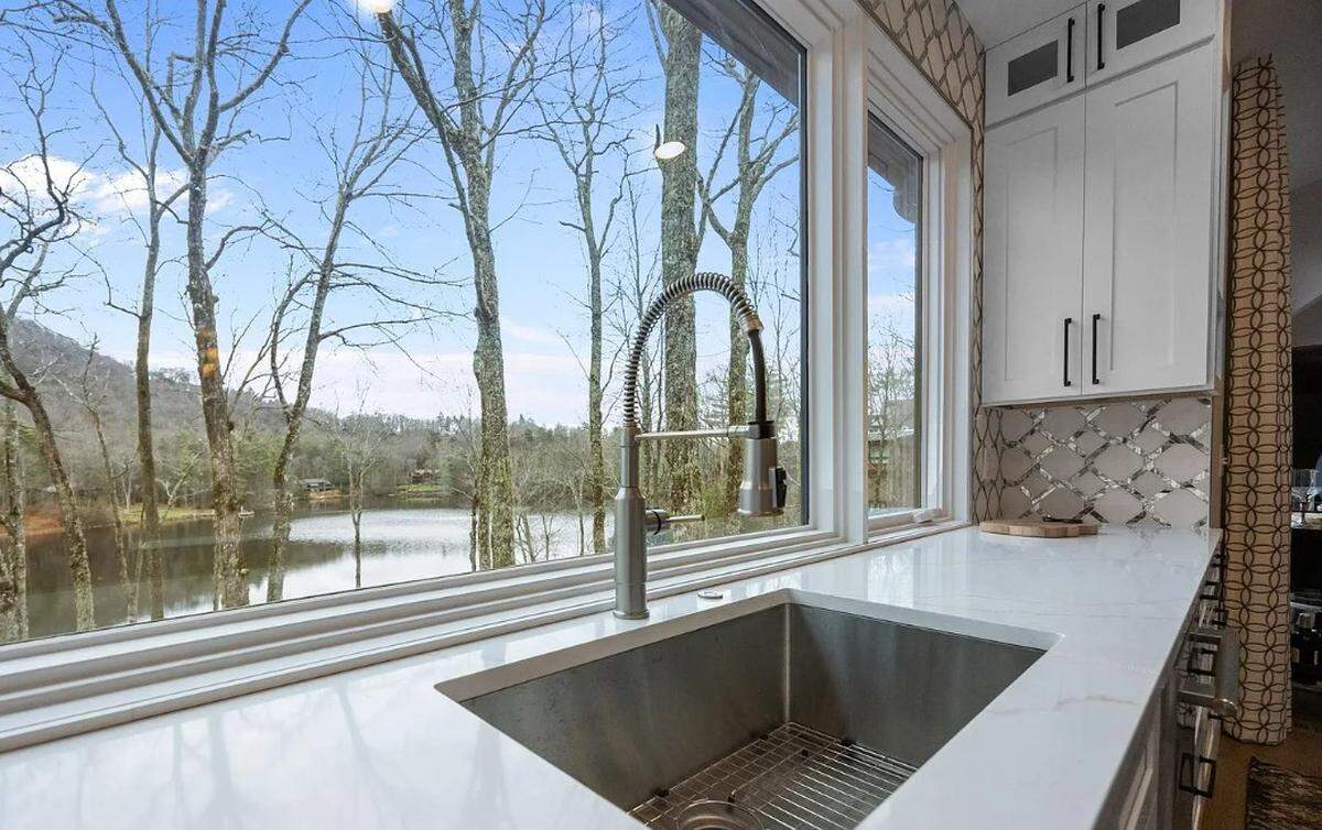 Many rooms in the home look out to Lake Cardinal.