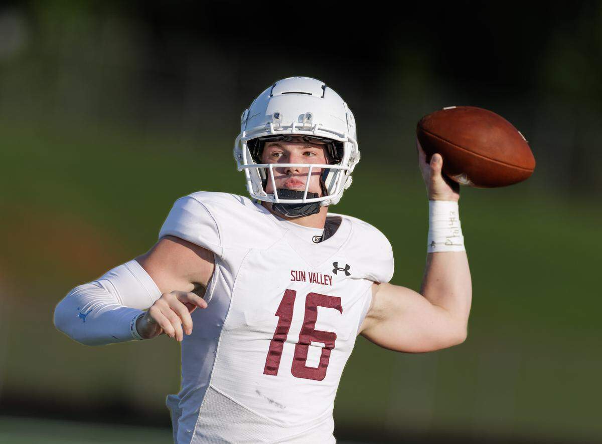 Senior quarterback Noah Lineberry drops back during a preseason scrimmage against Ardrey Kell. A standout for the Spartans, Lineberry has drawn interest from several Division I programs thanks to his strong arm and field awareness. With recruitment heating up, he’s expected to be a key leader in Sun Valley’s 2025 campaign. August 15, 2025.