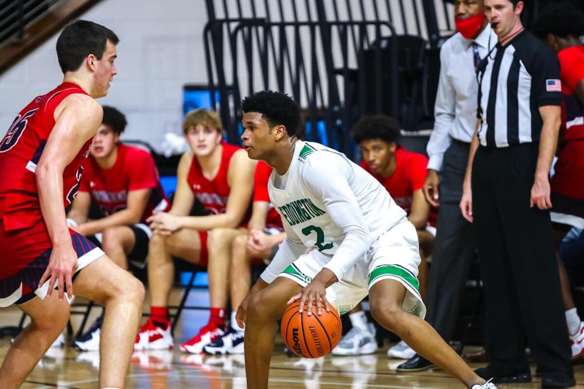 Chase Lowe brings the ball down the court