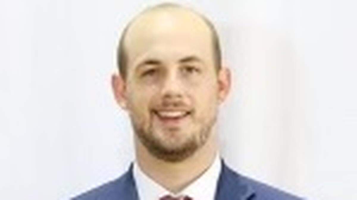 New Cox Mill boys basketball coach Davis Absher