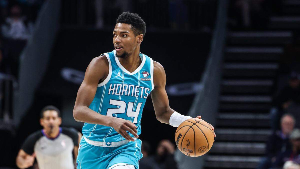 Charlotte Hornets forward Brandon Miller dribbles the ball up court against Utah Jazz at the Spectrum Center in Charlotte, N.C., on Saturday, January 27, 2024.