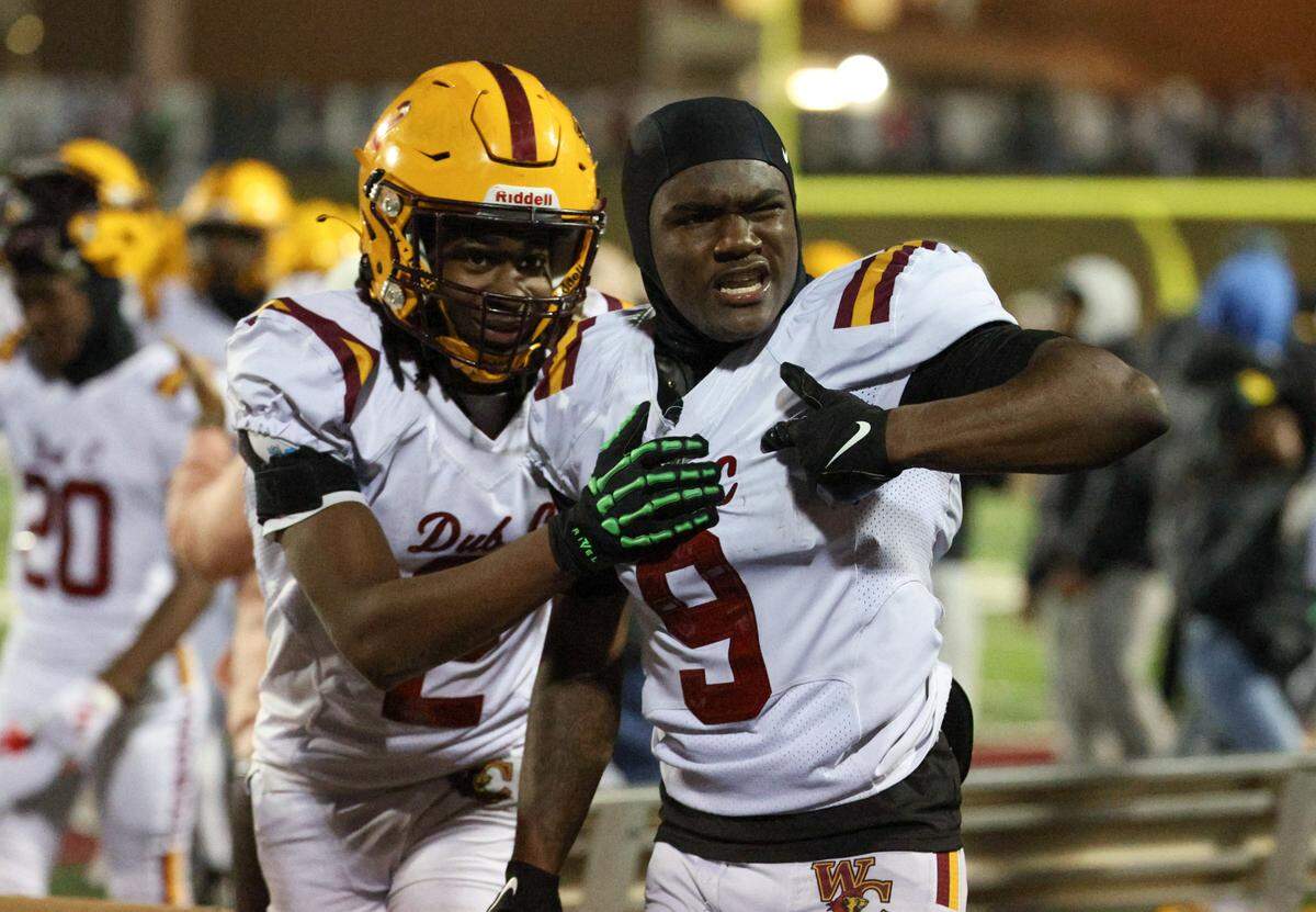 West Charlotte celebrates defeating Hickory, 36-20, during the NCHSAA 3A regional championship at Hickory High School on Friday, December 13, 2024.