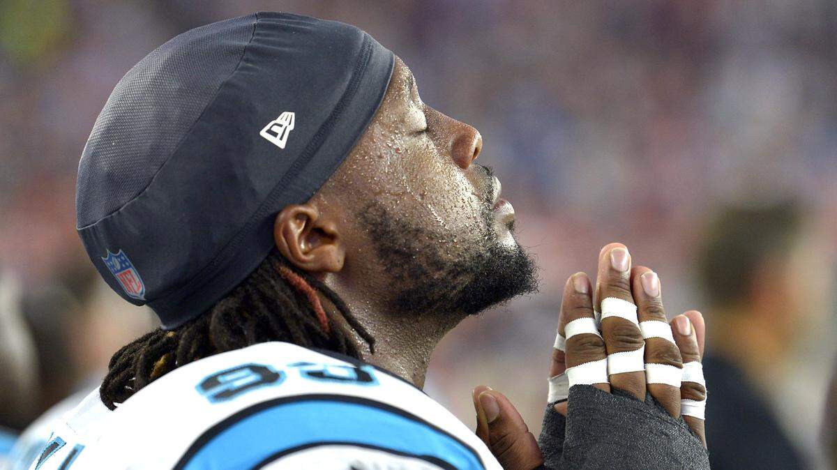 Carolina Panthers defensive tackle Gerald McCoy has a quiet moment before a game. McCoy said he and his teammates need to “have some pride as a man” in the team’s final three games.