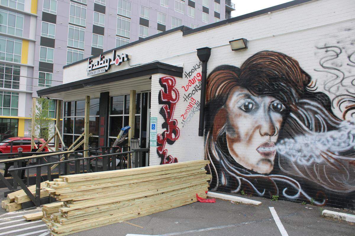 Charlotte-Mecklenburg police is looking for two vehicles they suspect are connected to the shooting at Babylon Hookah Lounge Monday morning.