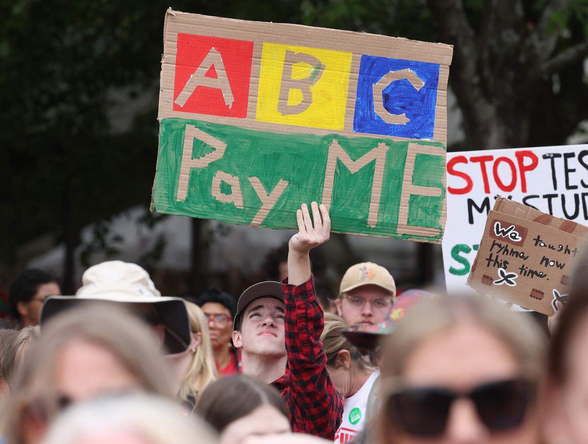 Signs, signs, signs were everywhere as teachers rallied at the Government Complex in Raleigh.