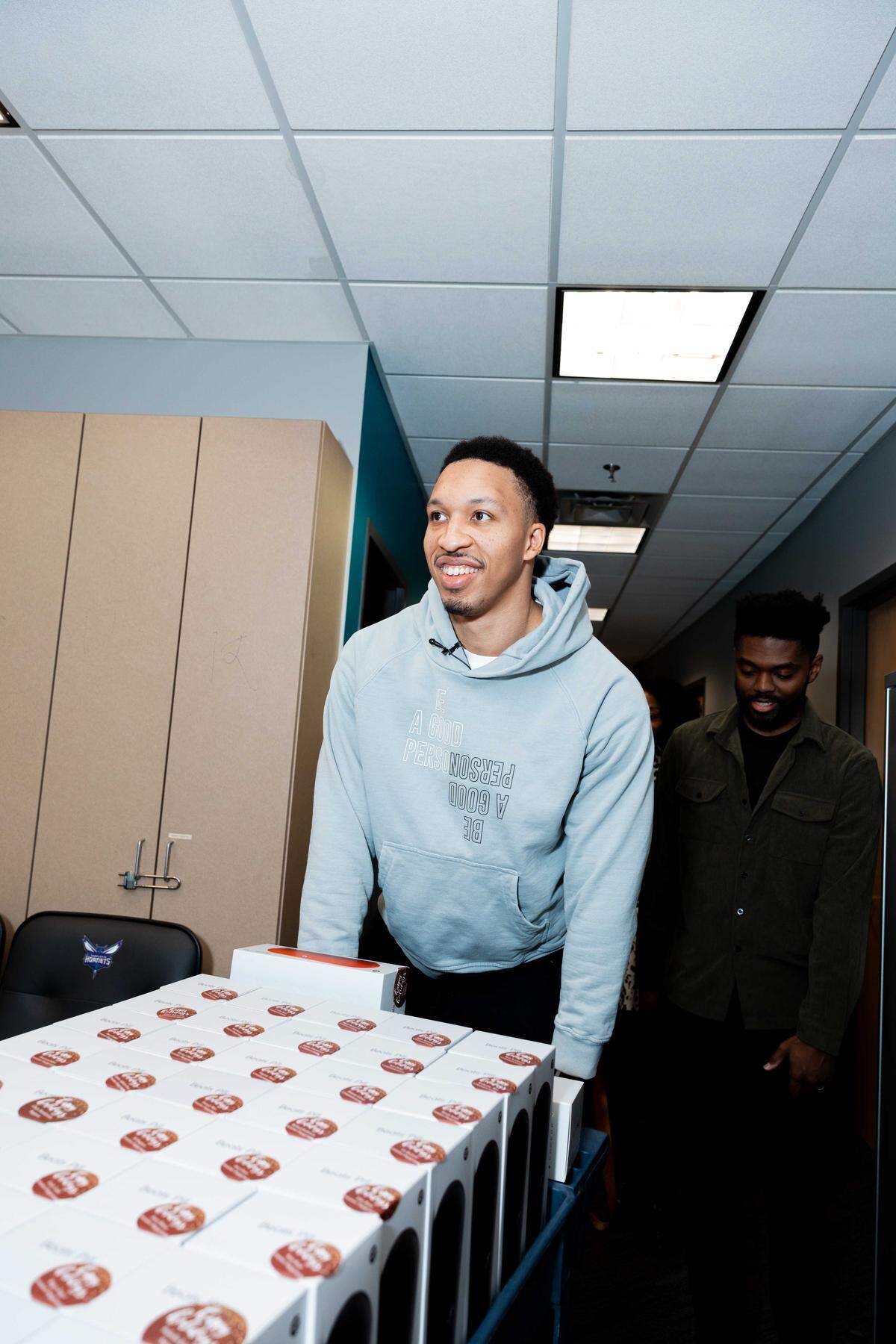 Charlotte Hornets big man Grant Williams hands out gifts to employees in his annual tradition.