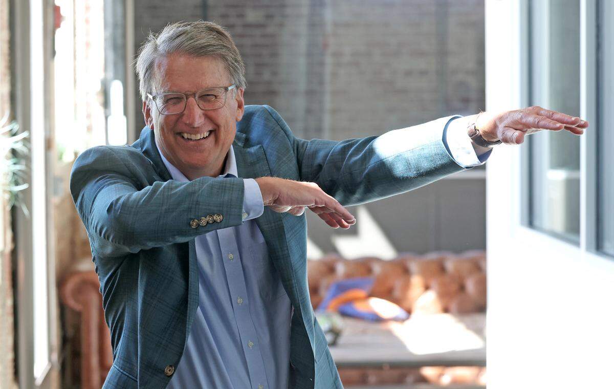 Former North Carolina governor and Charlotte Mayor Pat McCrory dabs in March following an interview.