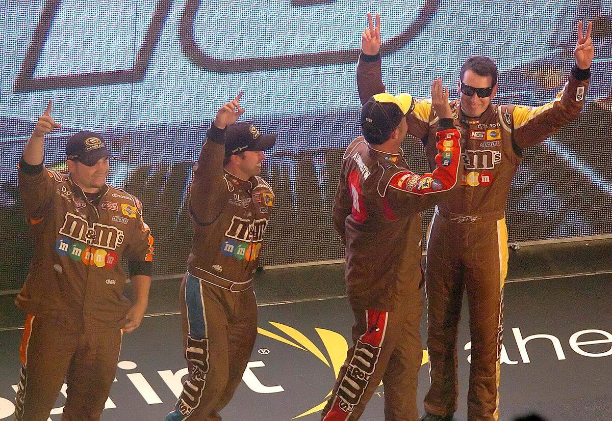 NASCAR Sprint Cup Series driver (right) Kyle Busch and his team acknowledge the cheers and jeers of the fans during introductions prior to the running of the Sprint All Star race on Saturday, May 17, 2008, at Lowe's Motor Speedway in Concord, North Carolina. (Jeff Siner/Charlotte Observer/MCT)