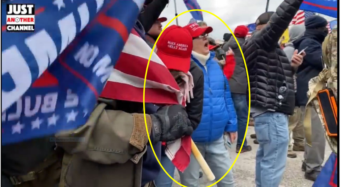 Sandra Hodges, a nurse from North Carolina, shouts at officers at the U.S. Capitol on Jan. 6, 2021.