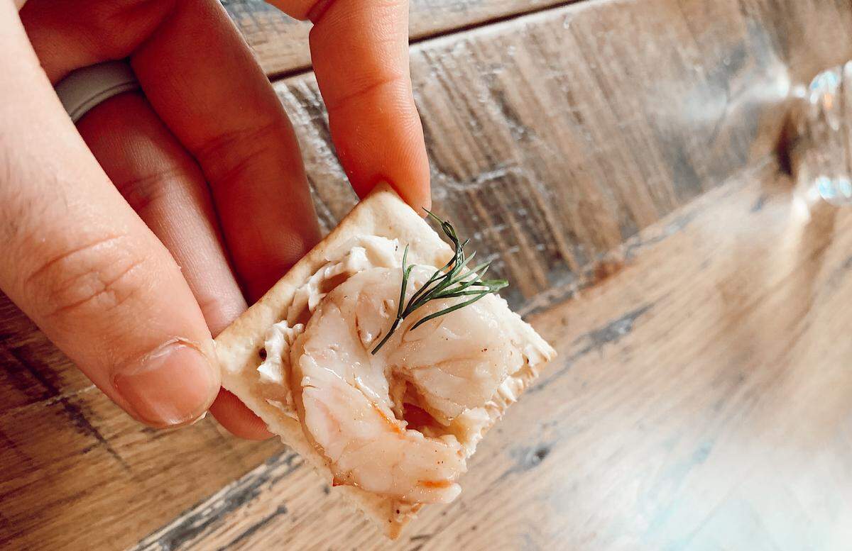 New on the bites menu at Goodyear House is marinated East Coast shrimp served with mignonette butter, chile oil and saltines.