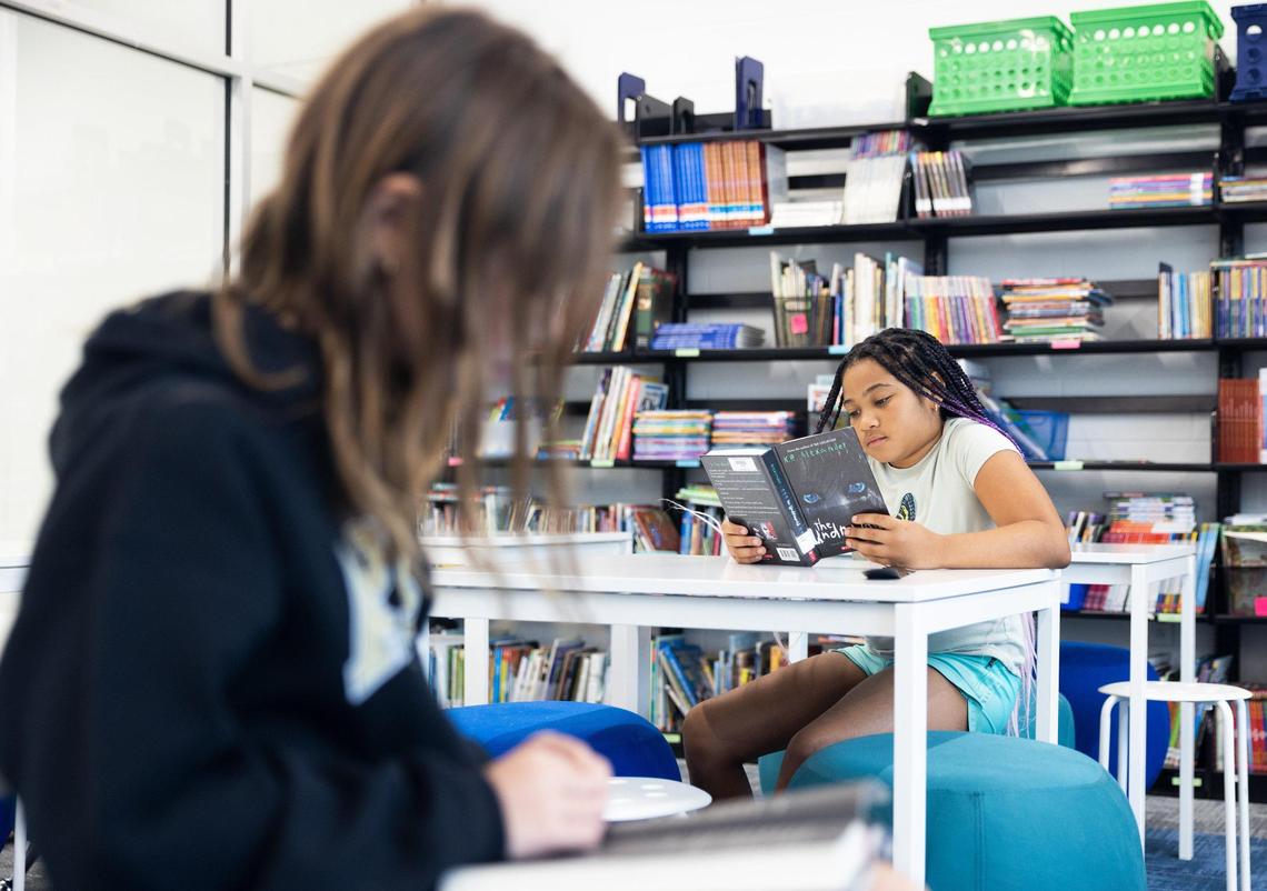 Sydney Nickelson reads in the media center at Lake Norman Charter Elementary School in Huntersville, N.C., on Thursday, September 8, 2022.