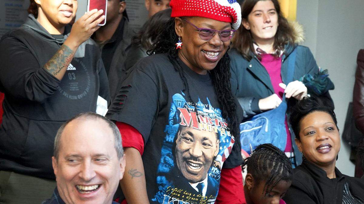 Charita Coleman enjoys the music of Quentin Talley & The Soul Providers with others at the Harvey B. Gantt Center for African American Arts + Culture in Charlotte, NC on Monday, January 20, 2020. 
The Gantt Center hosted a community and commemoration of the life and legacy of Dr. Martin Luther King, Jr. with a full day of programs and activities for all ages. 
Visitors were able to create art, enjoy live music, participate in spoken-word activities and discussions about current social issues.                                