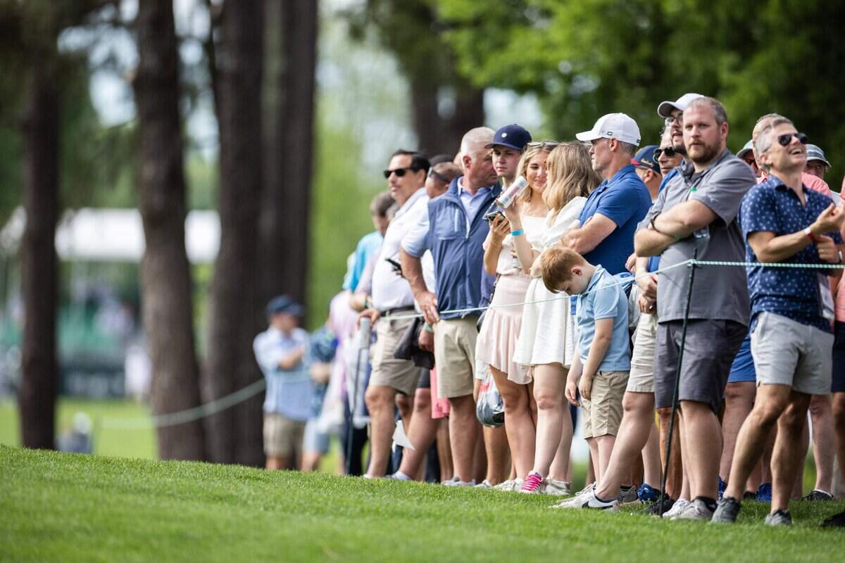 Fans watch during round one of the Wells Fargo Championship at Quail Hollow Club in Charlotte, N.C., on Thursday, May 9, 2024.