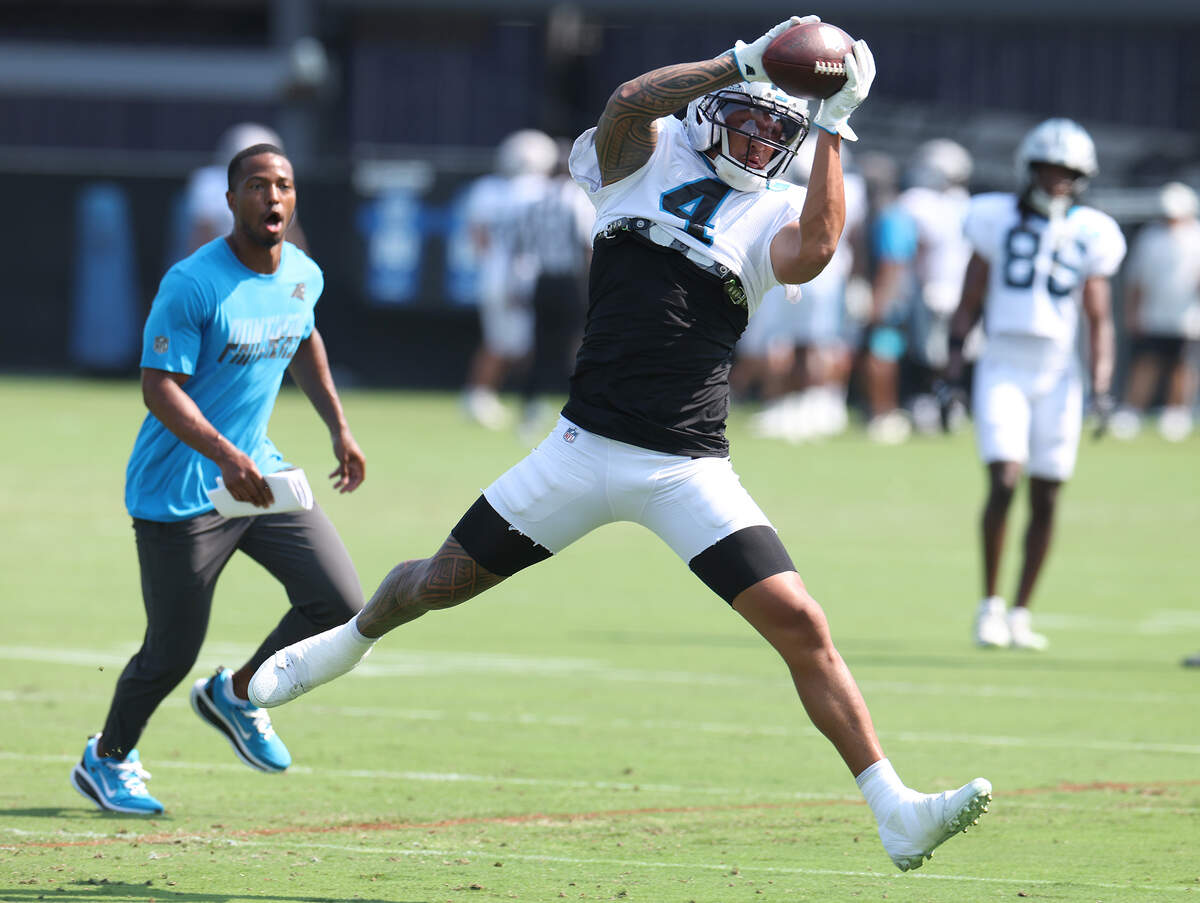 Carolina Panthers wide receiver Tetairoa McMillan secures a pass reception as he nears the sideline during the team’s training camp practice on Wednesday, July 29, 2026.