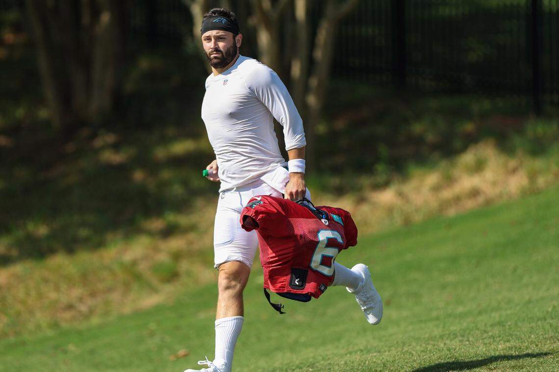 Panthers quarterback Baker Mayfield runs out to practice at Training Camp on Tuesday, August 2, 2022 in Spartanburg, SC.