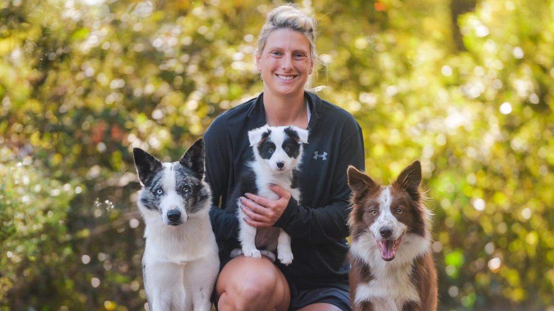 Laurren Zimmerman, a certified canine athlete specialist, shows off her border collies Dublin, Savage and Maestro.